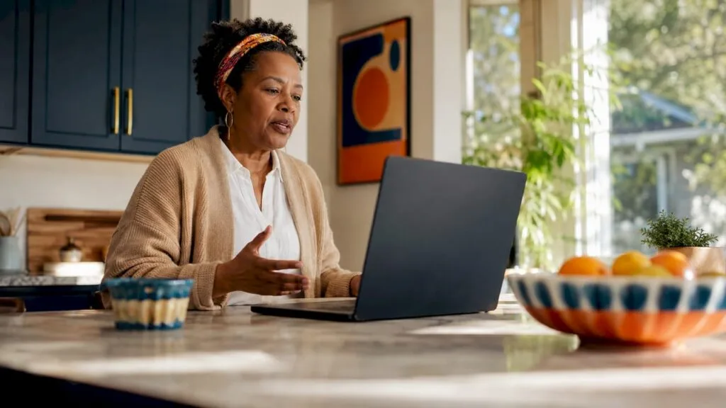 Manager leading virtual remote team meeting