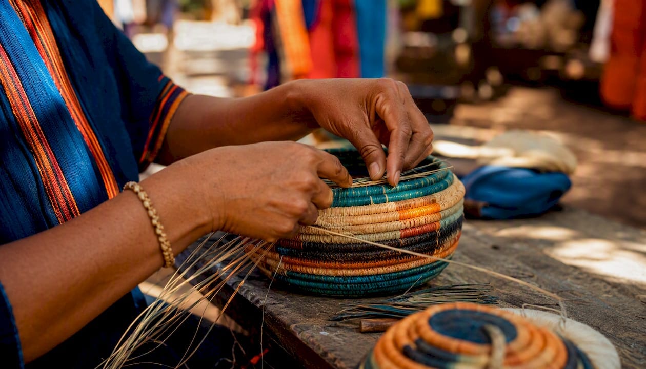 Hands weaving artisan basket