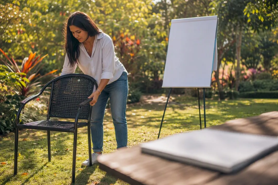Participant adjusting chair during leadership role-play