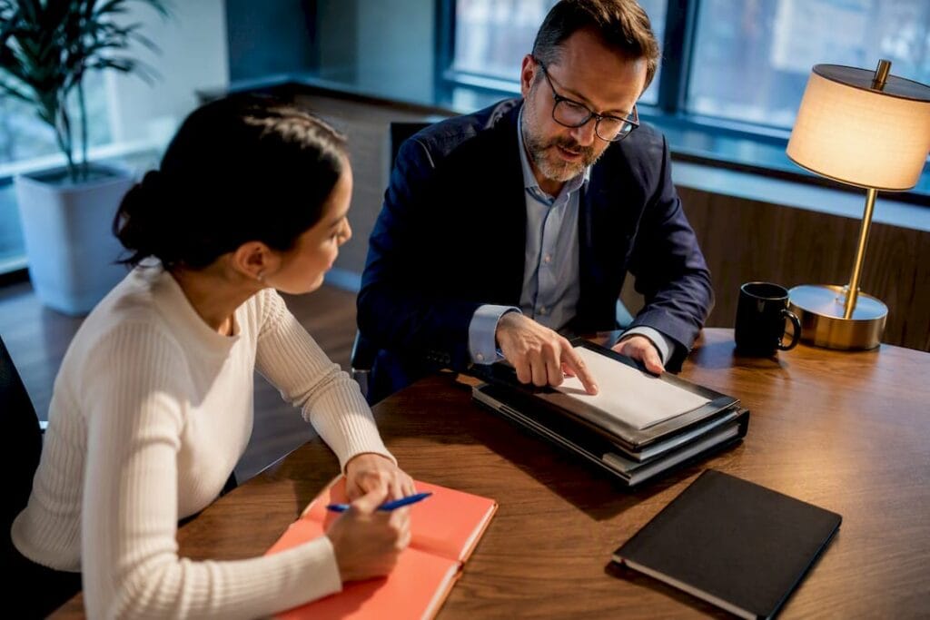 Founder reviewing loan requirements with lender