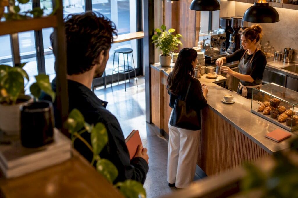Founder observing a coffee shop service test